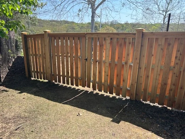 New cedar shadowbox fence with alternating panels