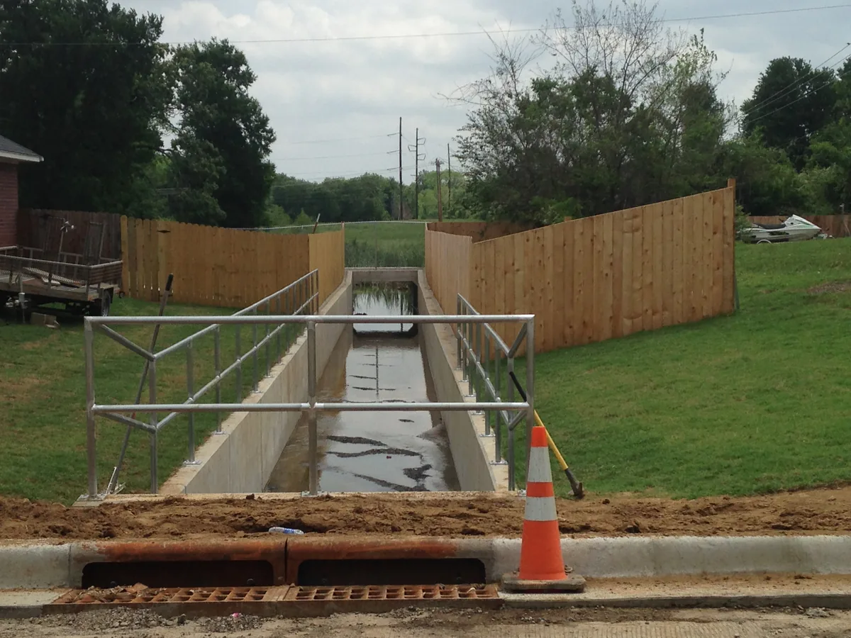 Temporary channel fencing around an active construction site