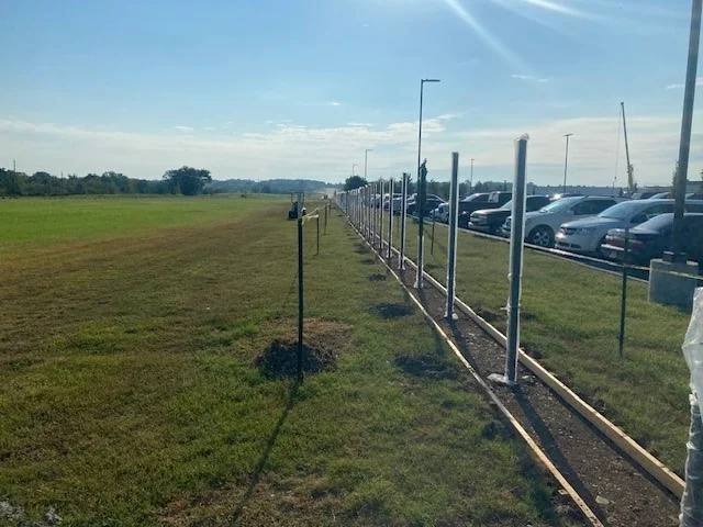 Perimeter security fencing around a school campus