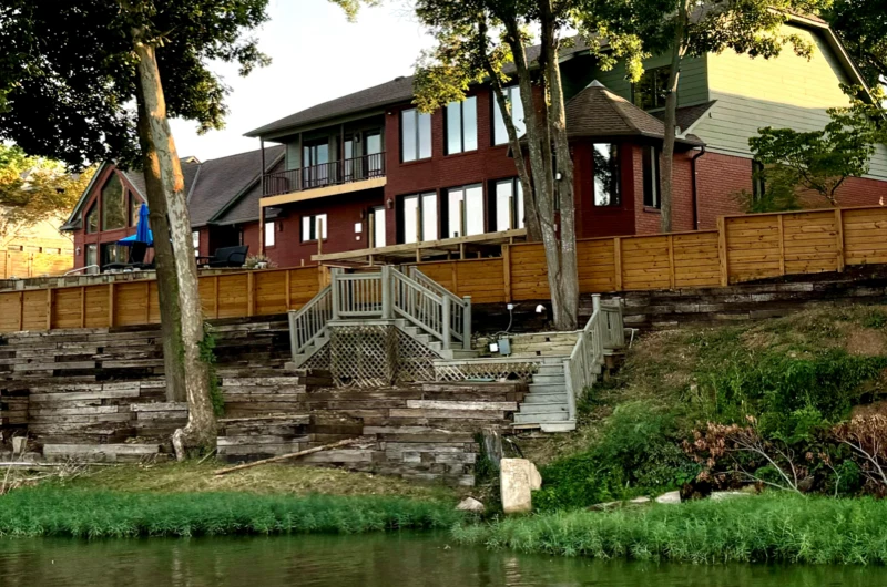 Wood privacy fence installed along a residential backyard