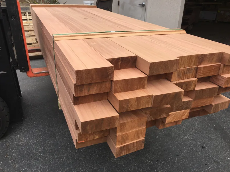 Bundled cedar fence boards ready for a project